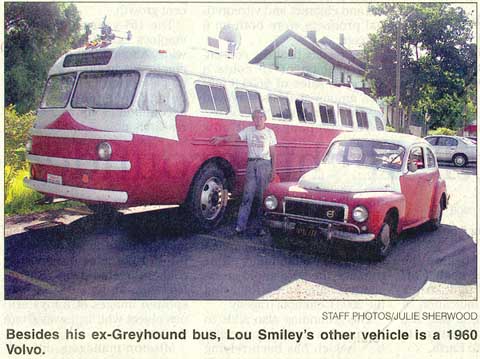 Lou Smiley with bus and car